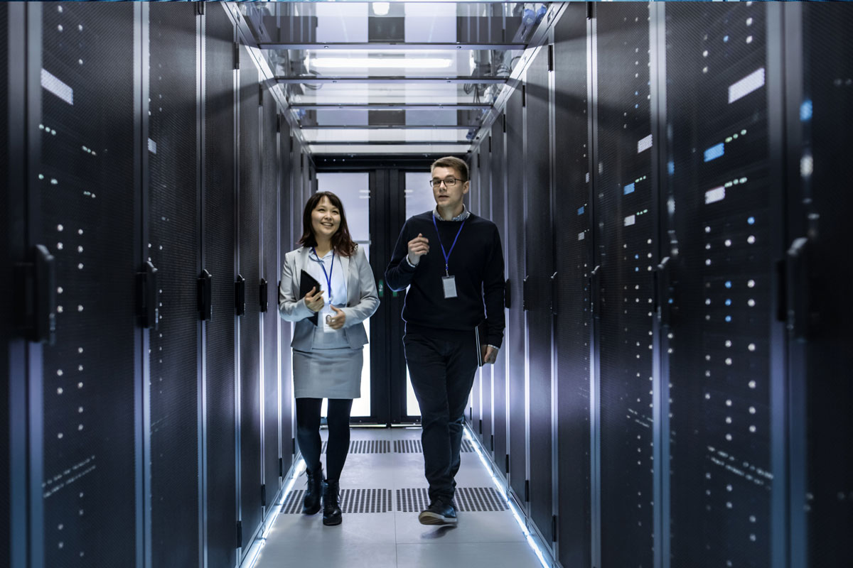 two specialists working on data centre installation project
